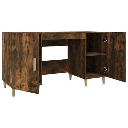 Bureau 140x50x75 cm bewerkt hout gerookt eikenkleurig